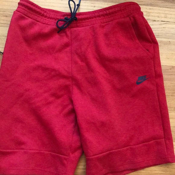 red nike tech shorts